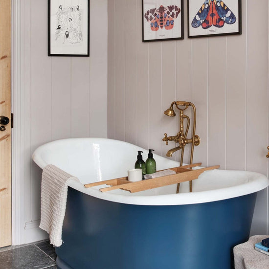 Traditional Francone BT23 wall mounted bath filler faucet in unlacquered brass, installed in bathrooom by Spencer & Wedekind, photo by Astrid Templier.