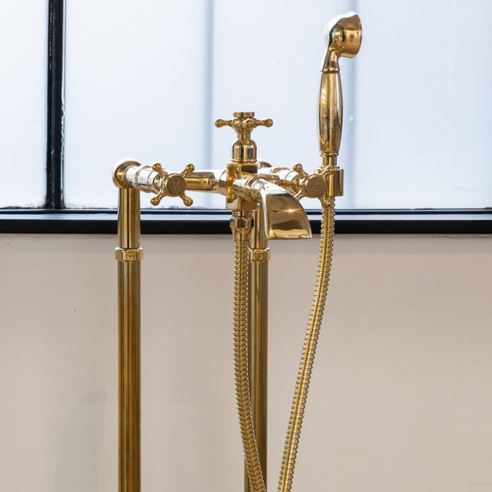 Francone BT25+F traditional floor-mounted bath filler faucet and hand shower in unlacquered brass.