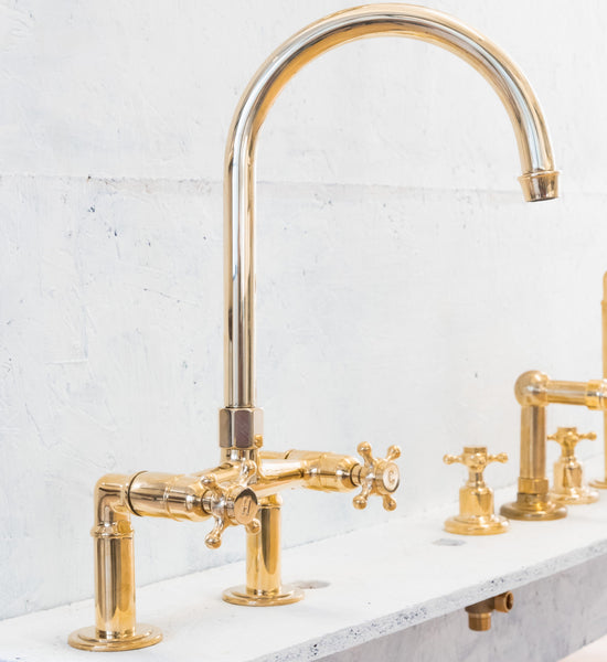 Traditional Francone BT28 unlacquered brass basin tap, a vintage deck-mounted double-handle faucet.