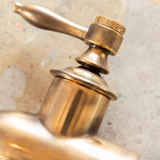 Detail of the Francone BT69F traditional kitchen faucet handle in an artisan old bronze living finish.