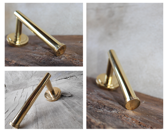 toilet roll holder in solid brass