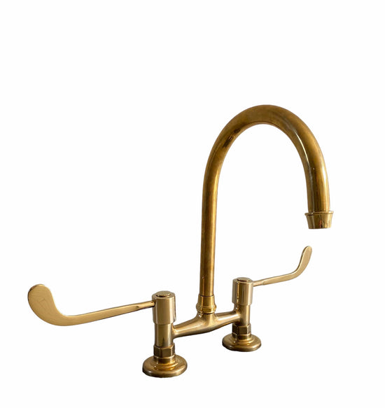 BT49L kitchen tap with curve swivel spout & Long levers
