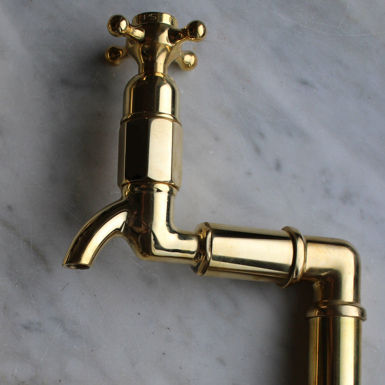 A close-up detail of the traditional Francone BT16D solid brass deck mounted pillar tap faucet.