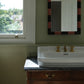 Traditional Francone BT17 unlacquered brass three-hole basin tap faucet installed in a bathroom.