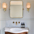 Traditional Francone BT18 unlacquered brass wall-mounted bathroom faucet on marble splashback by The TV Carpenter.