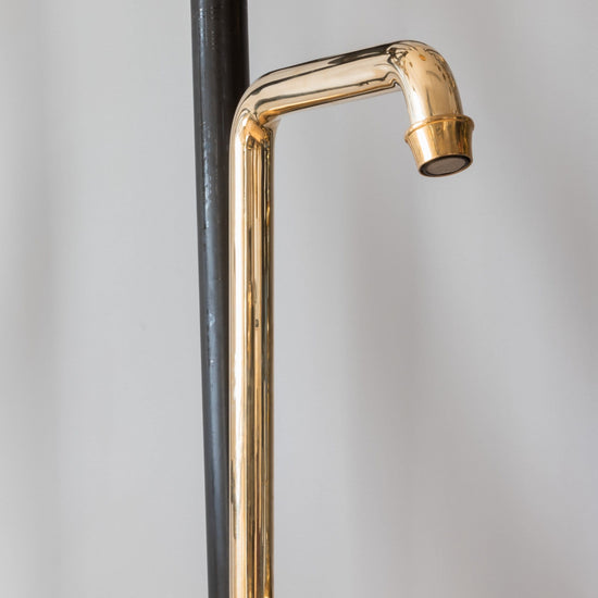 Detail of the Francone BT2 traditional wall-mounted unlacquered brass bathroom faucet swivel spout.