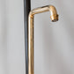 Detail of the Francone BT2 traditional wall-mounted unlacquered brass bathroom faucet swivel spout.