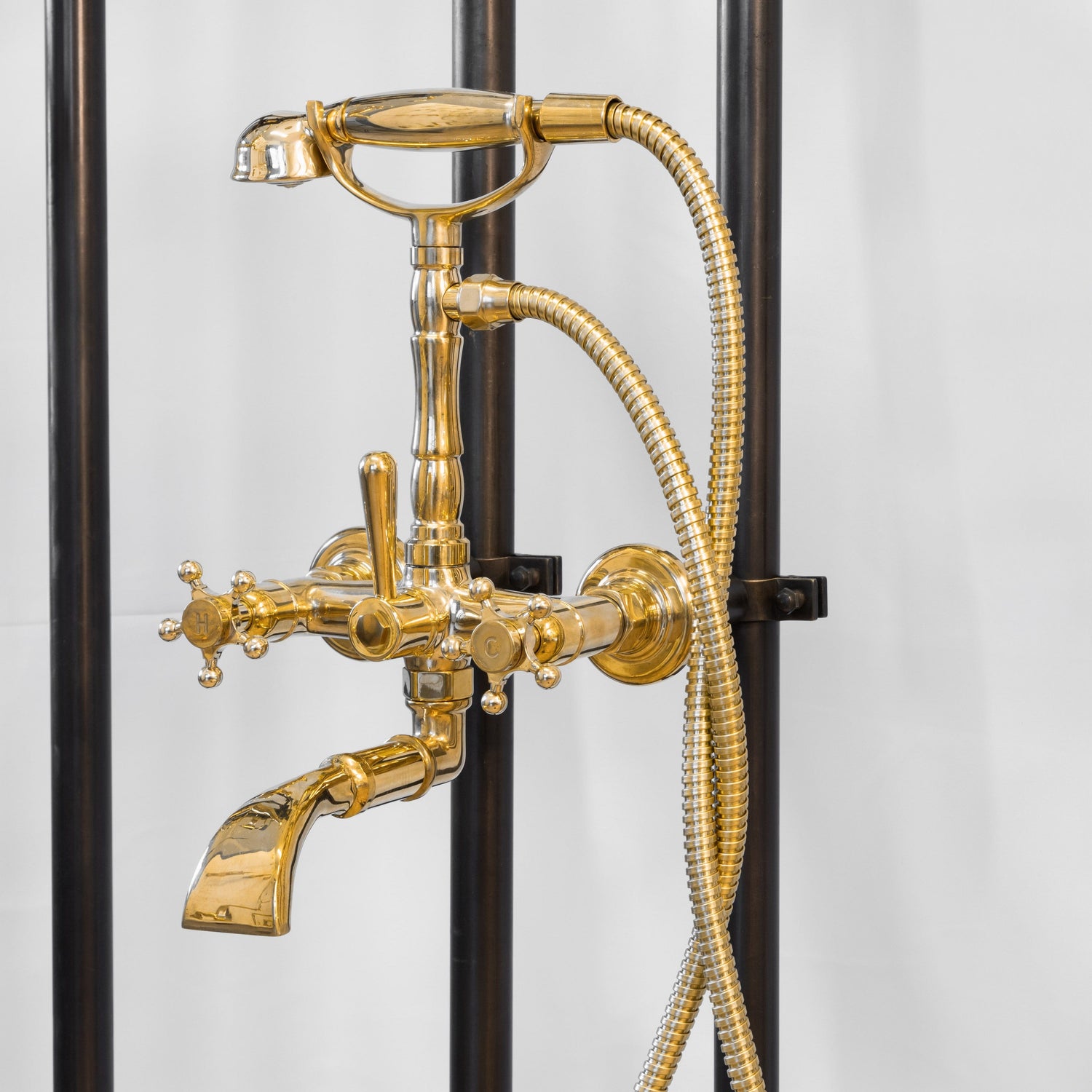 Francone BT23 traditional wall-mounted bath filler faucet with hand shower in solid brass.