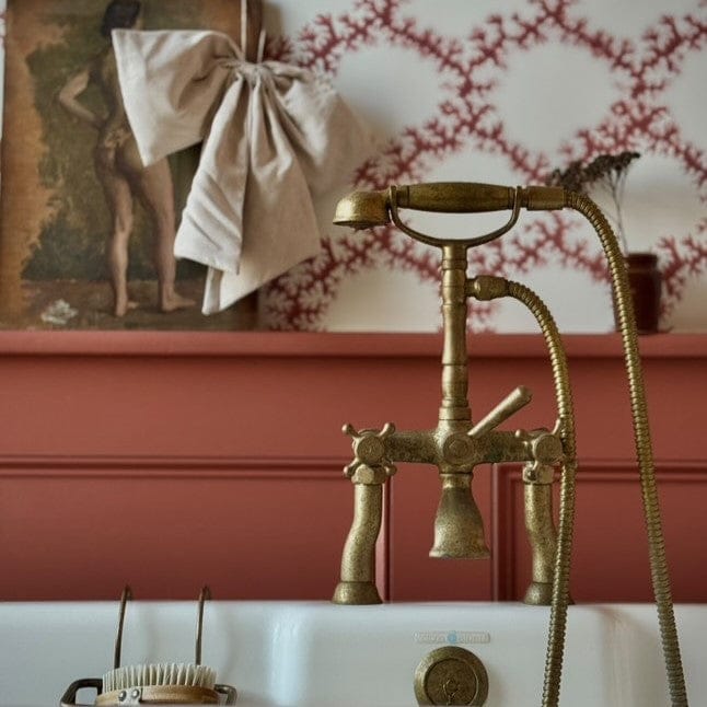 Traditional Francone BT23D solid brass deck-mounted bath filler faucet with hand shower in a bathroom.