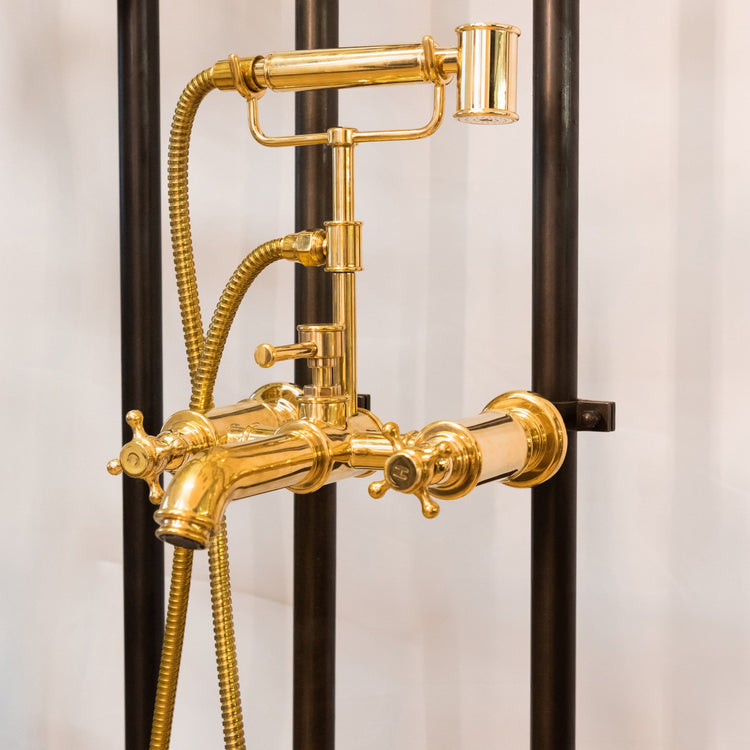 Traditional Francone BT23Z wall-mounted unlacquered brass bath filler tap and faucet with hand shower.