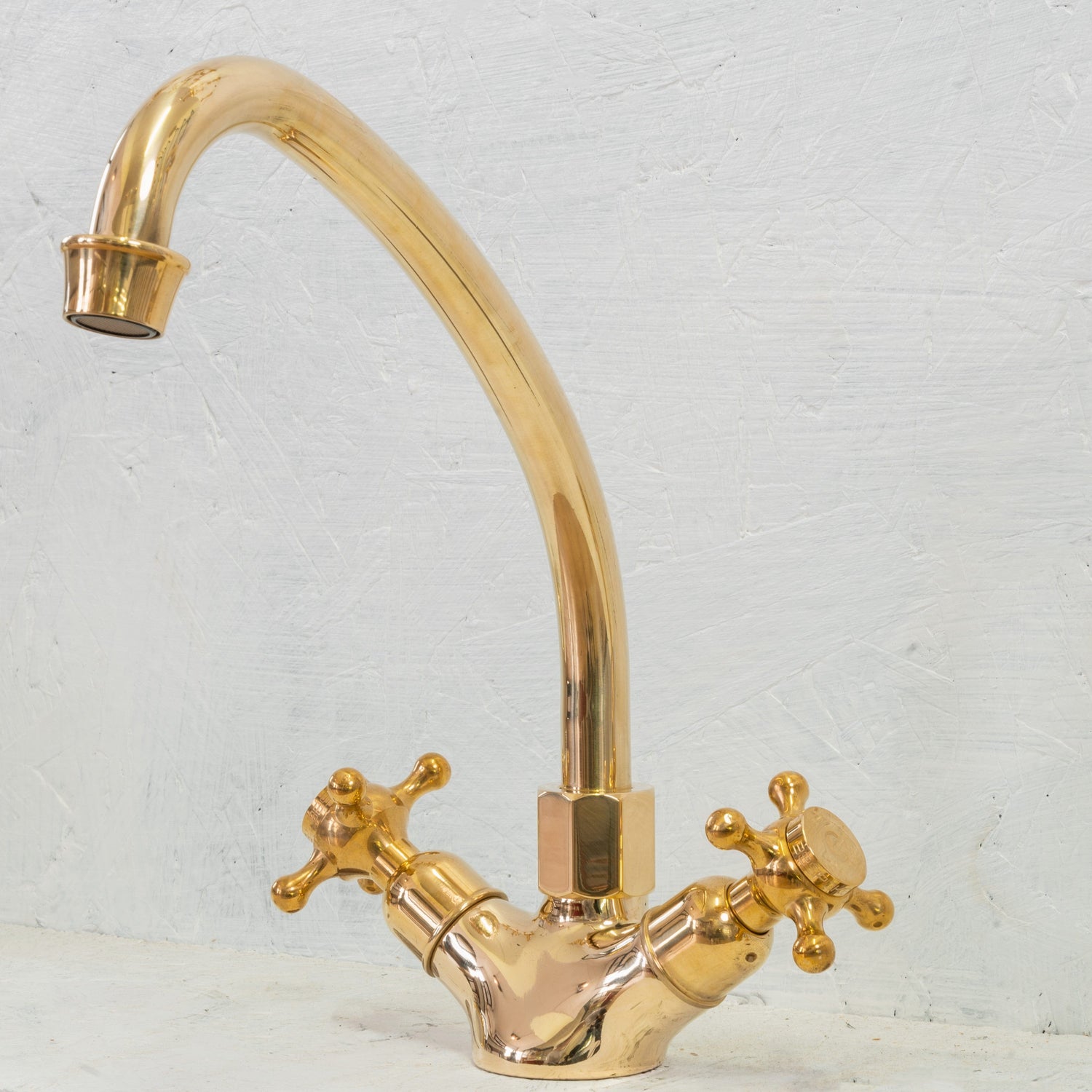 Francone BT24 traditional deck-mounted unlacquered brass faucet with a swivel spout.