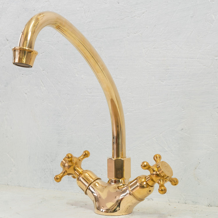 Francone BT24 traditional deck-mounted unlacquered brass faucet with a swivel spout.