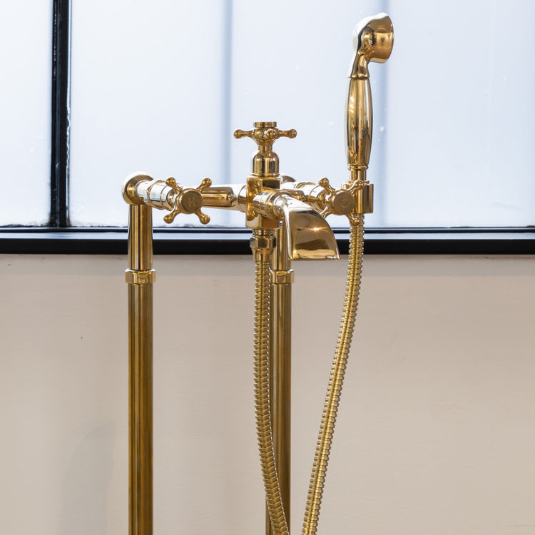 Francone BT25+F traditional floor-mounted bath filler faucet and hand shower in unlacquered brass.