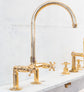 Traditional Francone BT28 unlacquered brass basin tap, a vintage deck-mounted double-handle faucet.