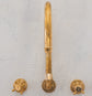 Traditional Francone BT32 wall-mounted bespoke unlacquered brass faucet with a swivel spout and hot/cold taps.