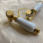 Francone BT34C traditional solid brass bathroom faucet handles with white ceramic levers.