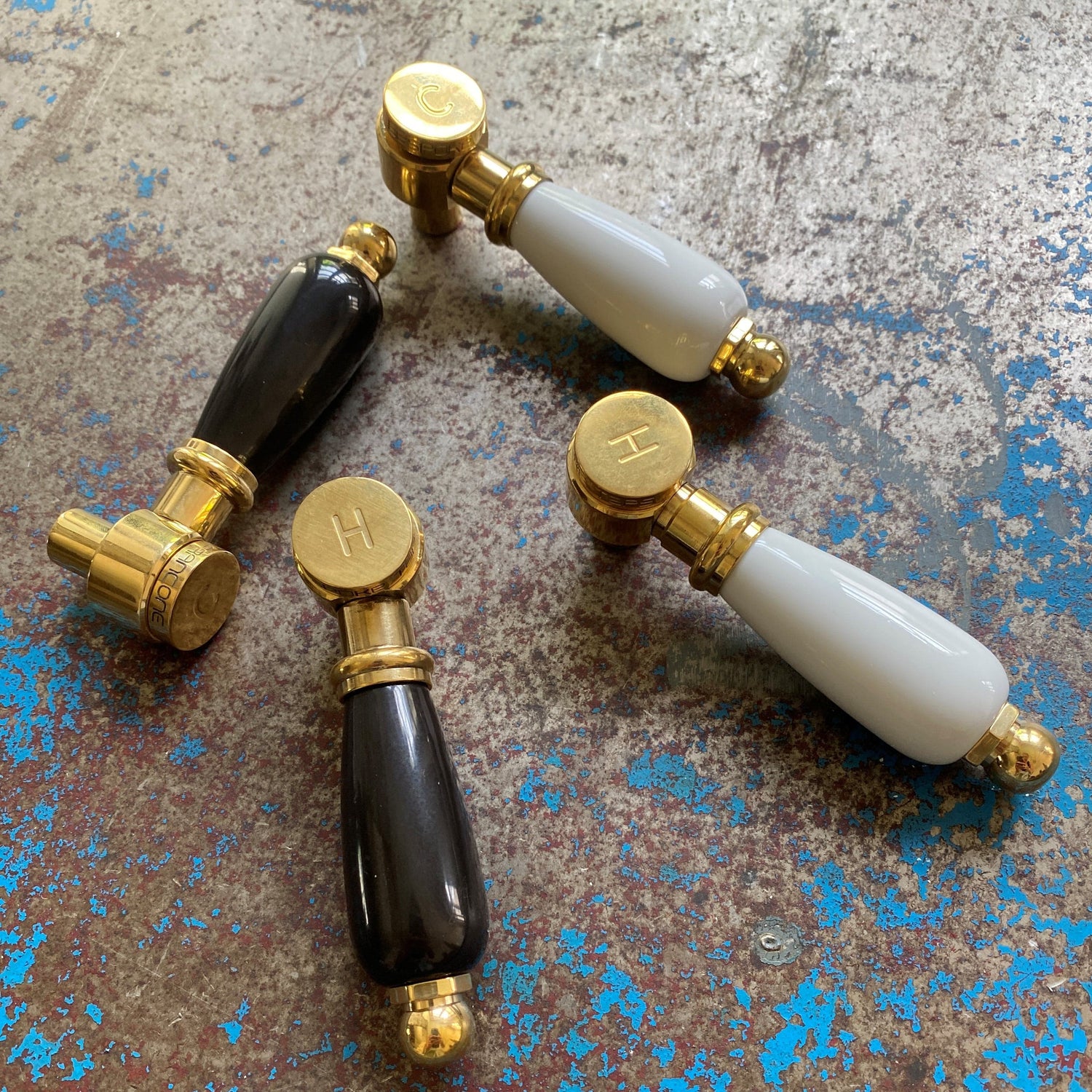Traditional Francone BT34C bathroom faucet lever handles in black and white ceramic with solid brass.