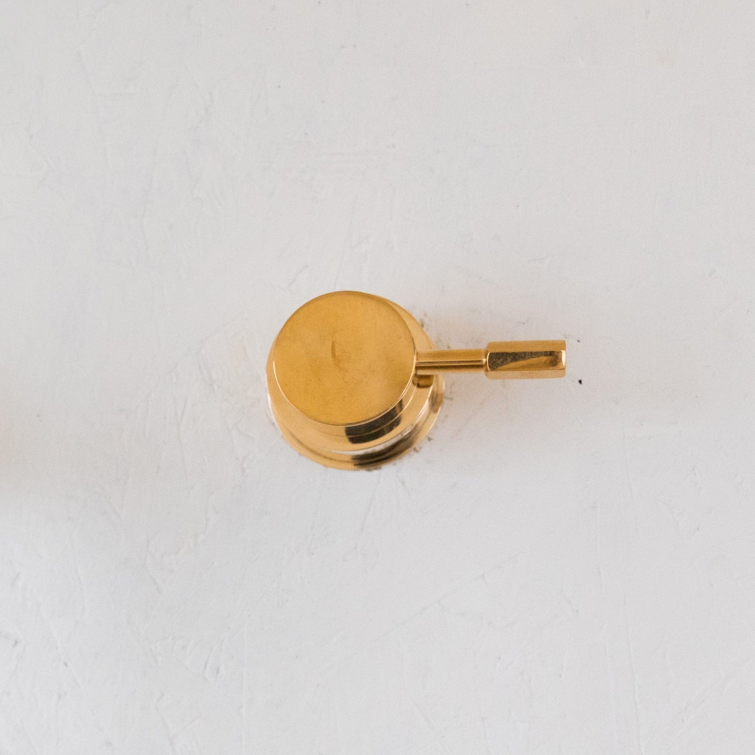 A close-up of the solid brass hexagonal pin lever tap handle from the Francone BT34H bathroom faucet.