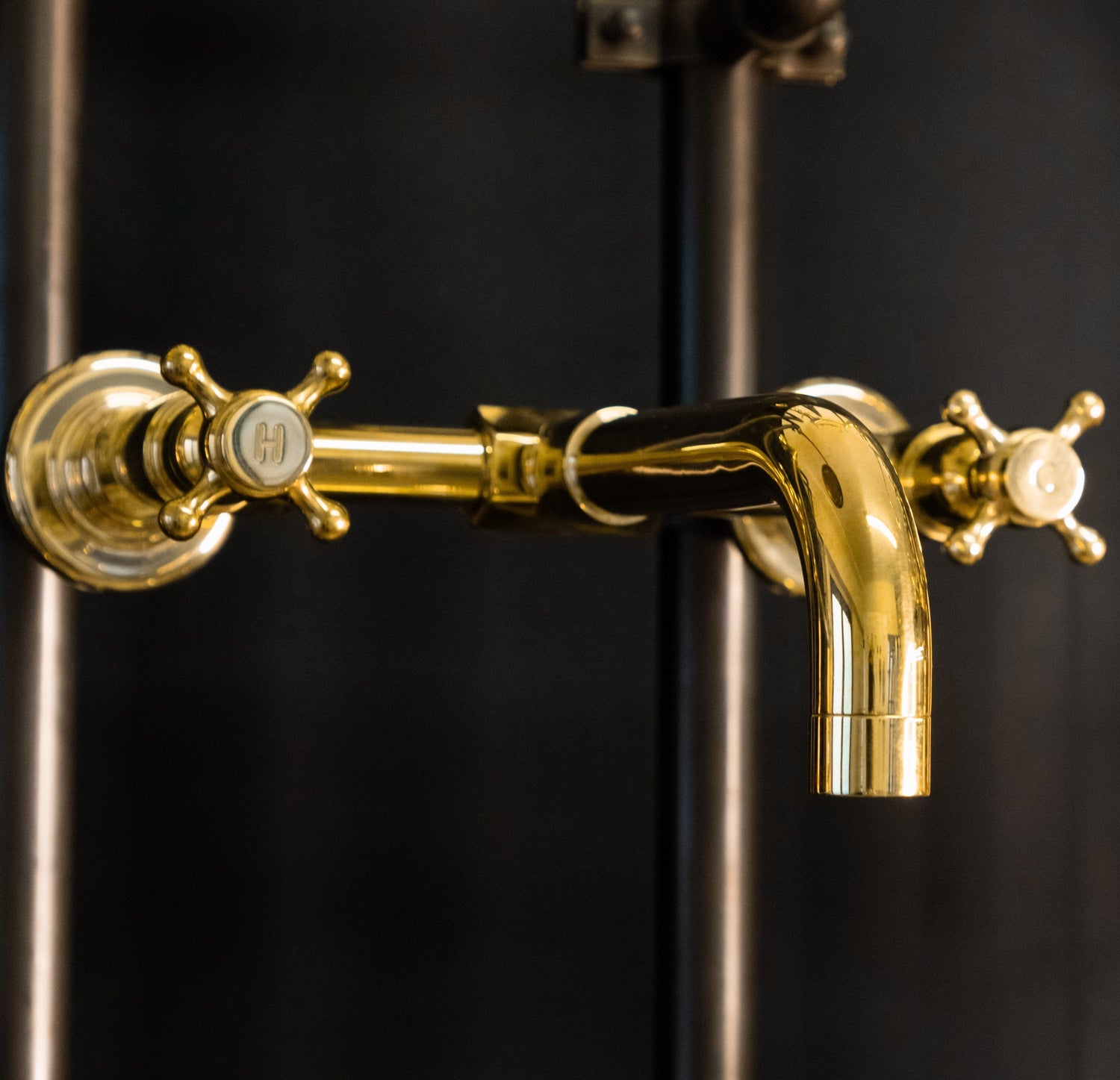 Close-up of the solid brass Francone BT34S wall-mounted tap, a bespoke traditional bathroom faucet.