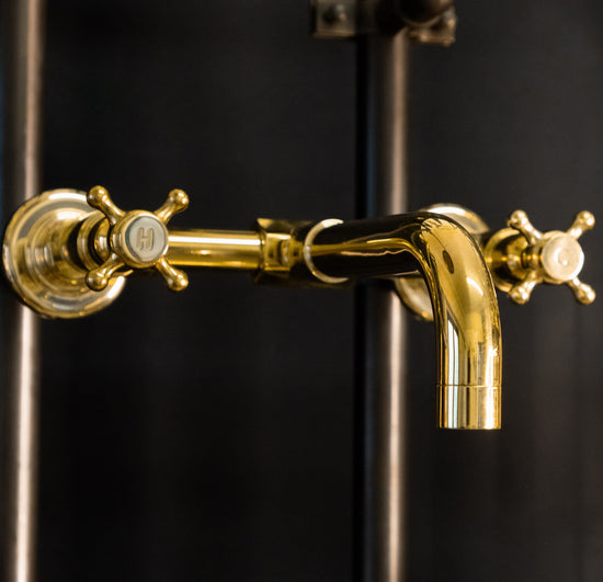 Close-up of the solid brass Francone BT34S wall-mounted tap, a bespoke traditional bathroom faucet.