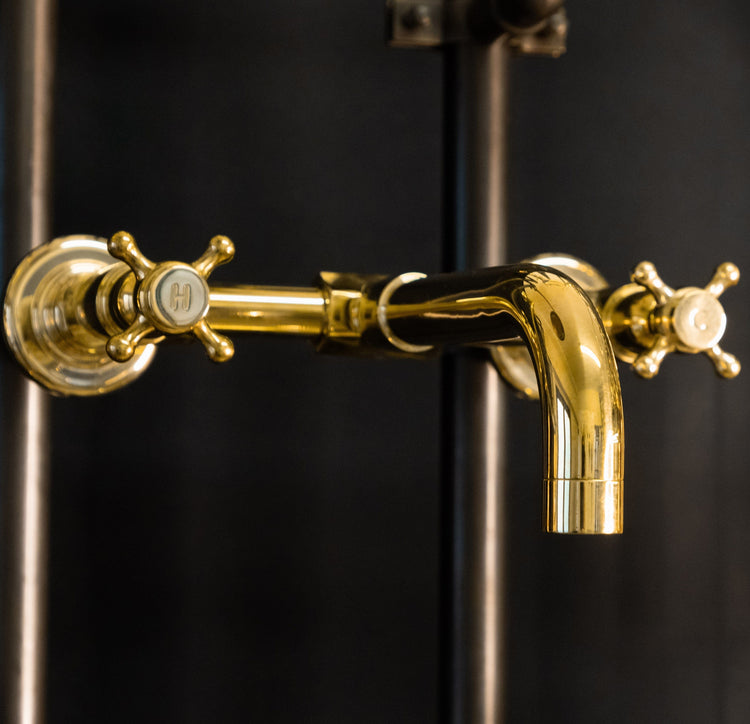 Close-up of the solid brass Francone BT34S wall-mounted tap, a bespoke traditional bathroom faucet.