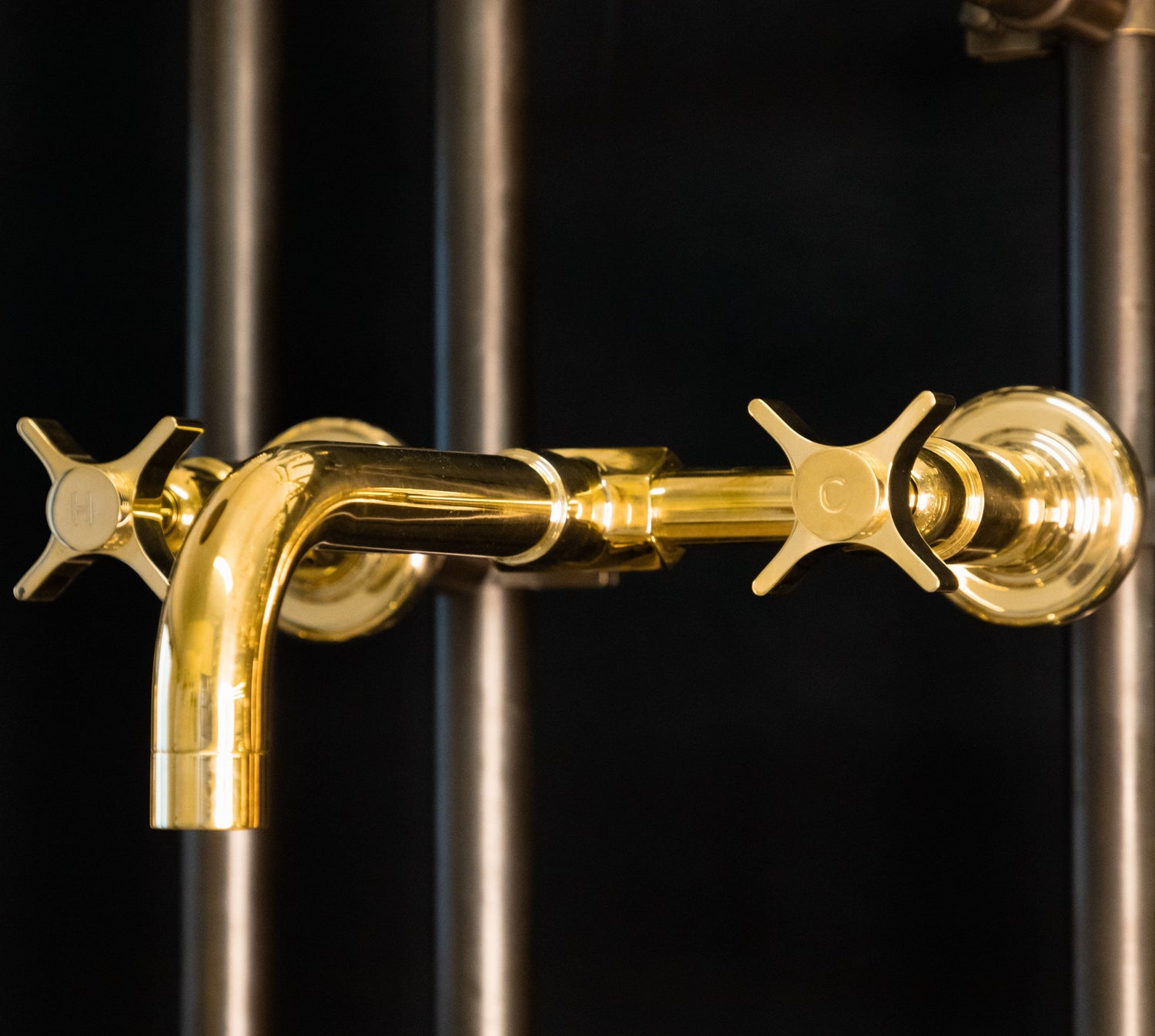 Close-up of the Francone BT34S traditional wall mounted bathroom faucet in unlacquered brass.