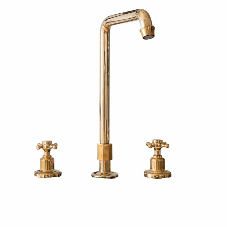 Traditional Francone BT38 three-hole deck-mounted bathroom faucet in unlacquered brass.