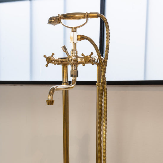 Traditional Francone BT3F unlacquered brass floor-mounted bath filler faucet with hand shower, made in Italy.
