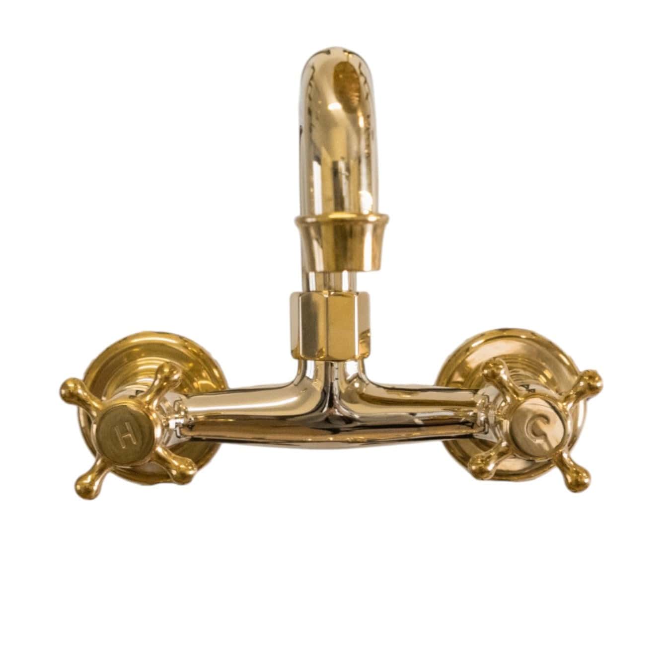 Francone BT40 wall mounted traditional hot and cold tap in unlacquered brass with cross handles.