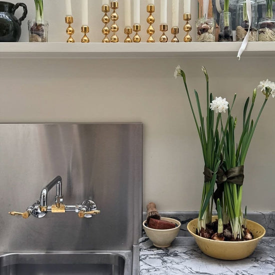 Traditional Francone BT40S wall-mounted kitchen faucet handcrafted in mixed metals, installed.
