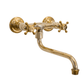 Francone BT41 classic wall mounted traditional tap with two cross-shaped unlacquered brass handles.