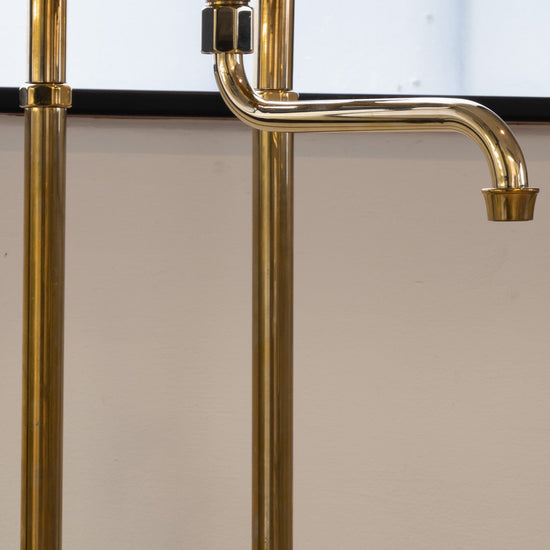 Detail of the solid brass swivel spout of the traditional Francone BT41F Italian bathroom faucet.