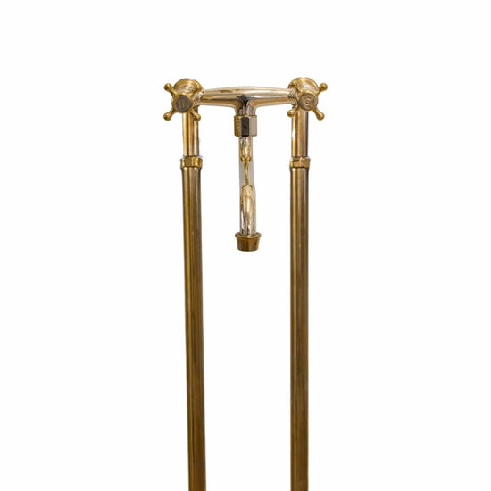 Francone BT41F traditional floor-mounted unlacquered brass bathroom faucet with stands.