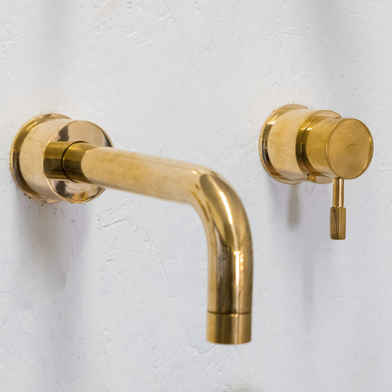 Francone BT42 solid brass wall-mounted mixer tap, a two-hole bathroom faucet with a curved spout.