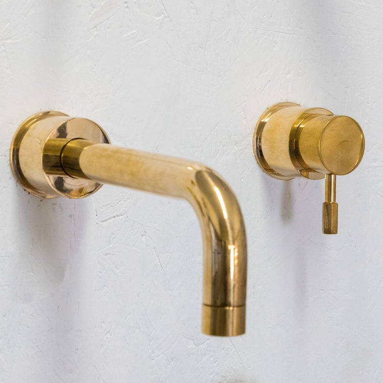 Francone BT42 solid brass wall-mounted mixer tap, a two-hole bathroom faucet with a curved spout.