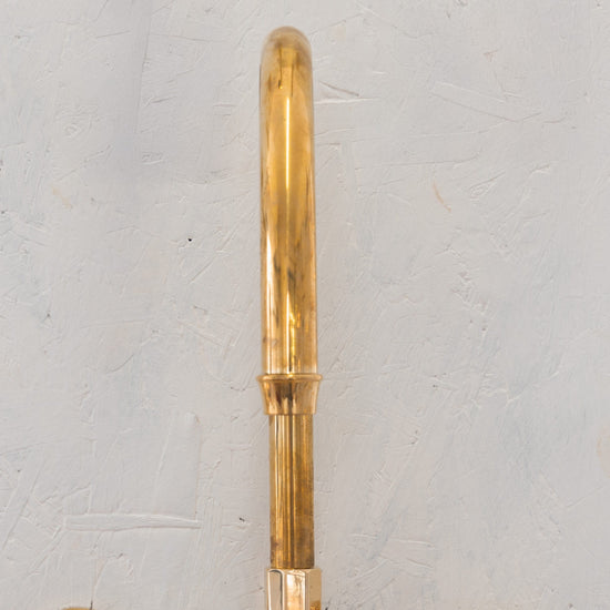 Detail of the Francone BT45 wall-mounted solid brass swivel spout bathroom faucet.