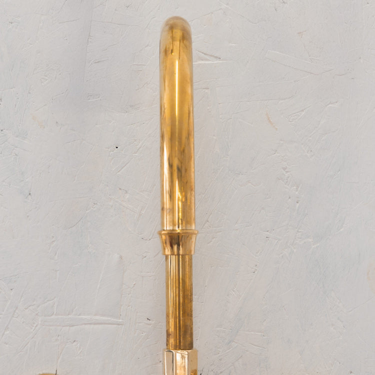 Detail of the Francone BT45 wall-mounted solid brass swivel spout bathroom faucet.