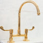 Francone BT49L traditional kitchen faucet in unlacquered brass with long lever handles.