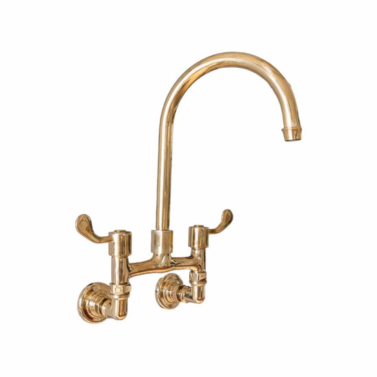 Traditional solid brass kitchen faucet, the Francone BT49LW wall-mounted tap with long levers.
