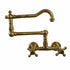 Traditional Francone BT54 unlacquered brass wall-mounted pot filler kitchen faucet with double cross handles.