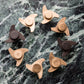 Francone BT55 bathroom faucet spinner handles shown in a selection of mixed metal finishes.