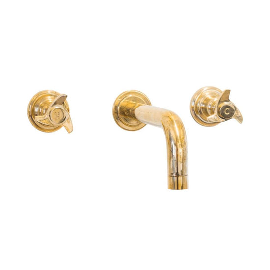 Traditional Francone BT55 unlacquered brass wall mounted bathroom faucet with spinner handles, made in Italy.