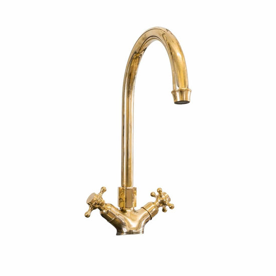 Francone BT57 traditional deck-mounted kitchen tap with curve spout, in unlacquered brass.