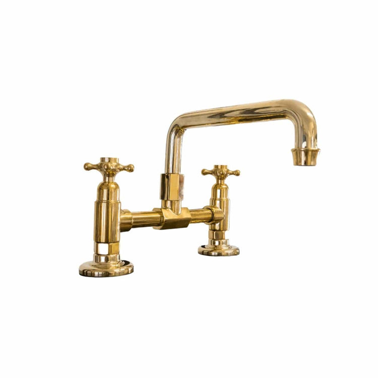 Traditional Francone BT63 unlacquered brass tap, a bespoke deck-mounted faucet with a custom base and swivel spout.
