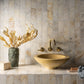 Francone BT65 wall-mounted traditional faucet in solid brass, installed above a yellow stone basin.