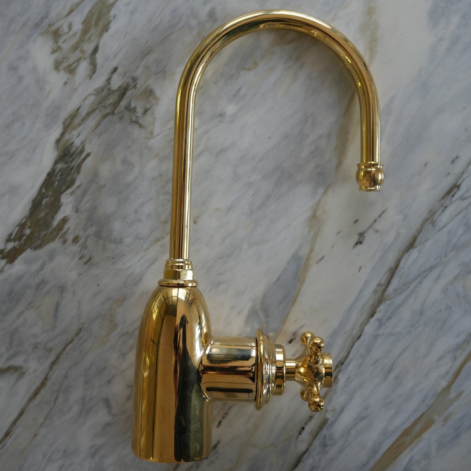Traditional kitchen filtered water tap, the Francone BT69F faucet in unlacquered brass.