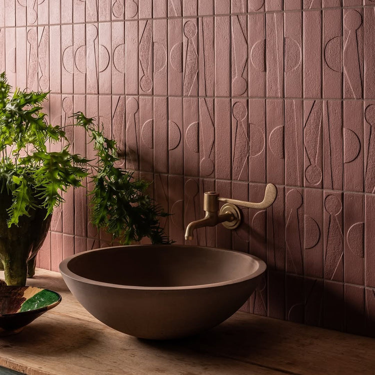 Francone BT72L traditional wall-mounted brass tap faucet installed above a basin in a pink tiled bathroom.