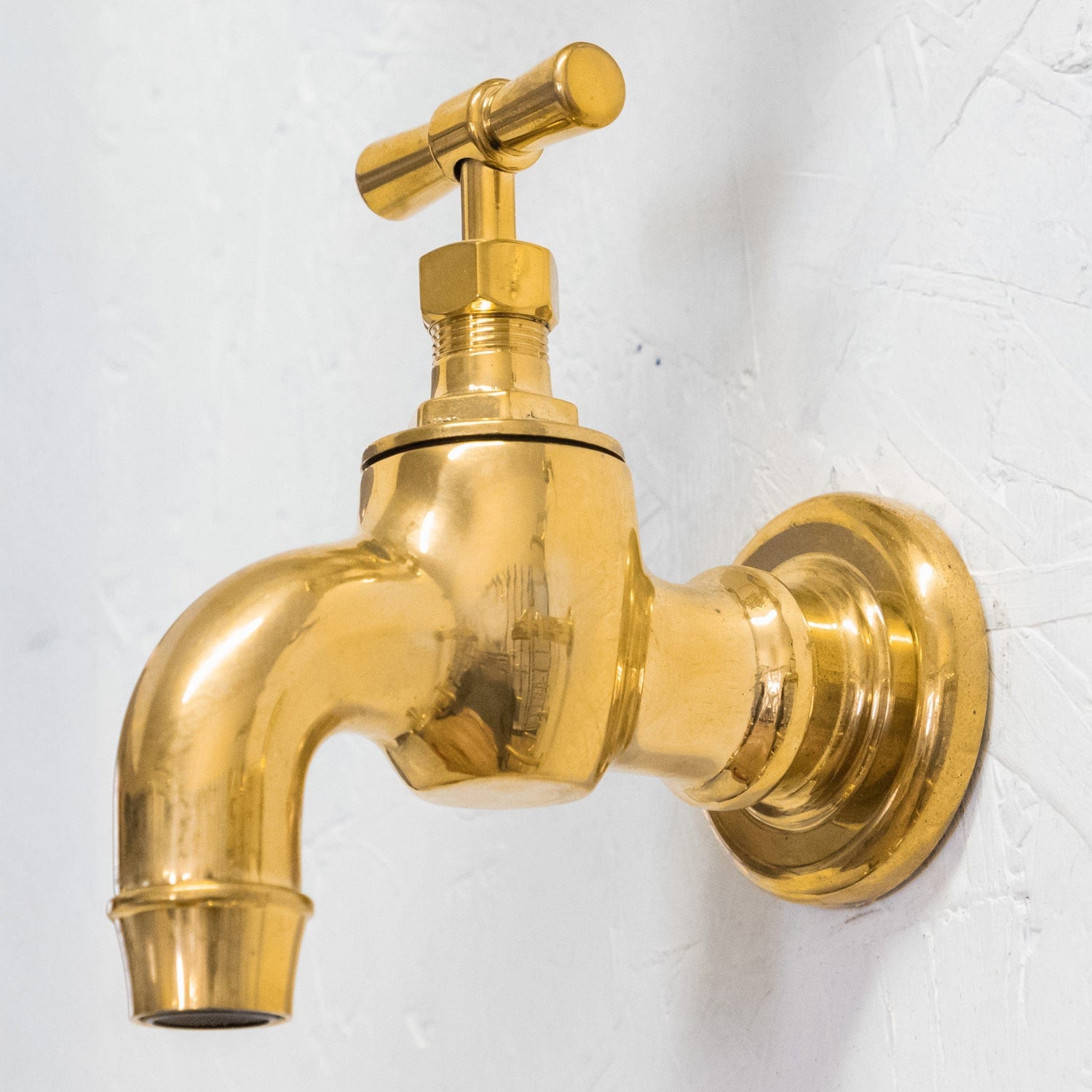 Traditional Francone BT74 unlacquered brass wall mounted bib tap faucet for a vintage bathroom.