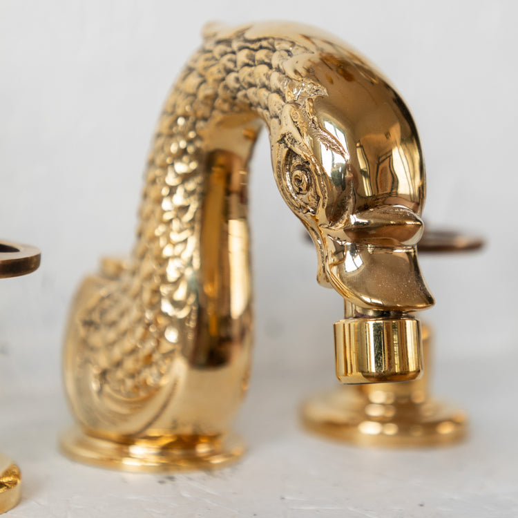 Detail of the Francone BT80B unlacquered brass swan bidet faucet, a traditional Italian design.