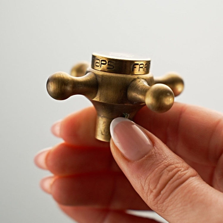 Handcrafted Francone BT81 tap handle in unlacquered satin bronze, a traditional Italian bathroom faucet detail.